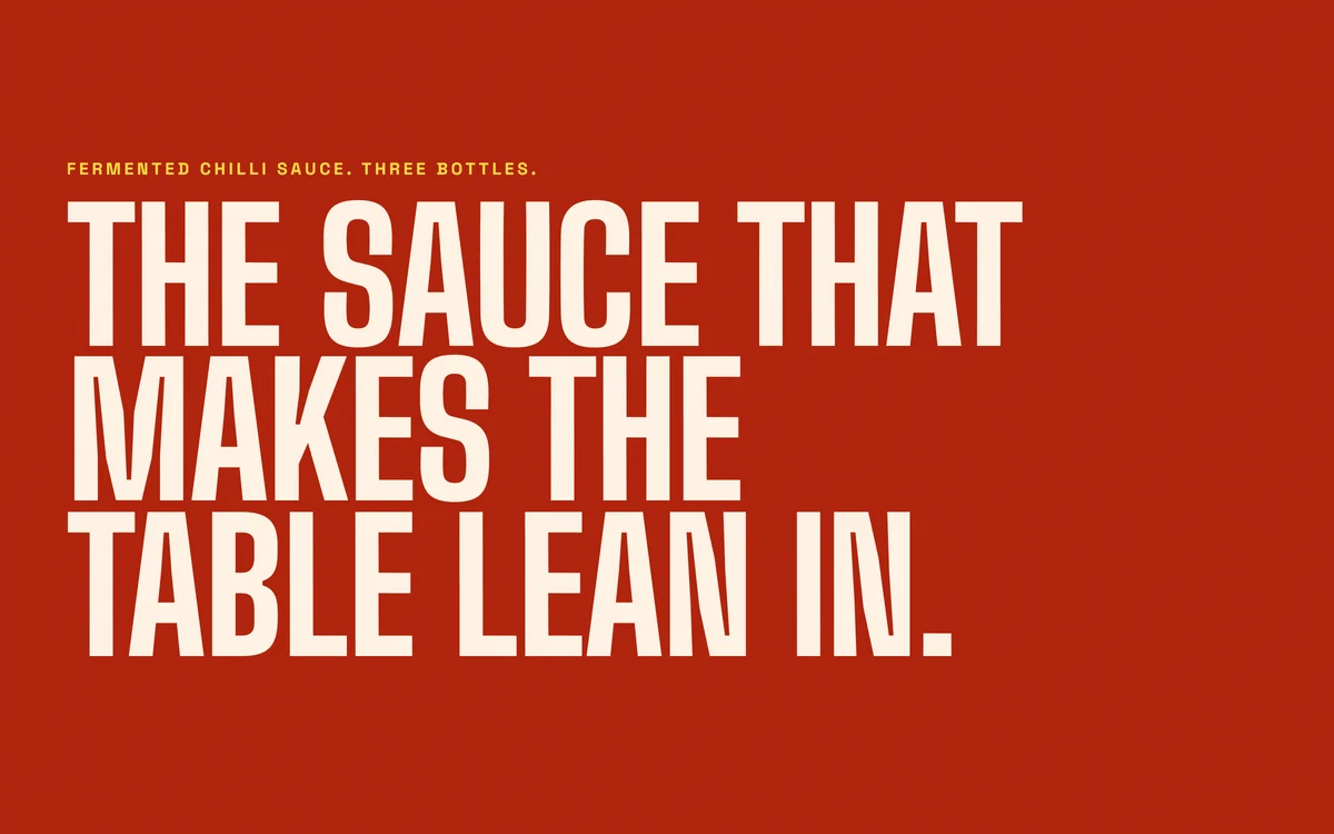 The Appetite hero: 'The sauce that makes the table lean in.' set huge on a chilli red ground.